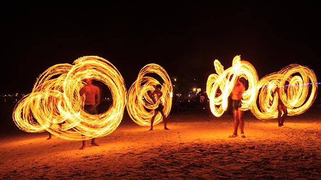 Fire Spinner Royal Kona Luau Voyagers of the Pacific Hawaii Adventure Tours. Book today
